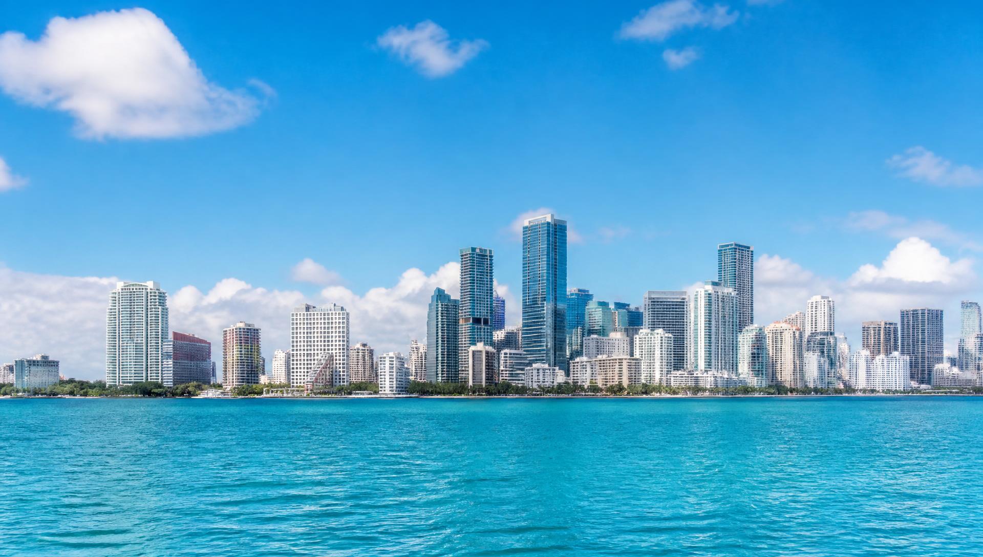 Miami skyline across Biscayne Bay on a bright day